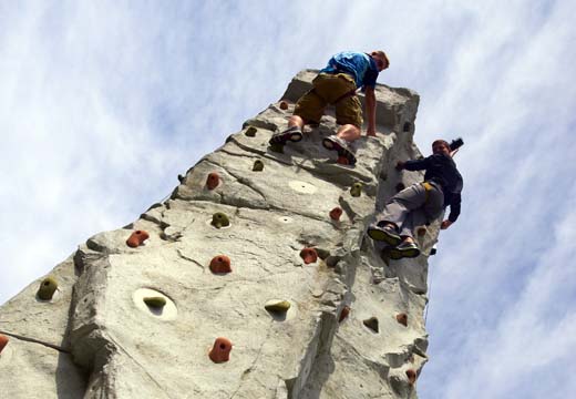 Students on rock wall.